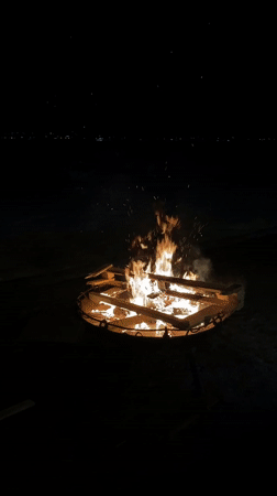 Evening beach gathering with bonfire documented in Votkinsk