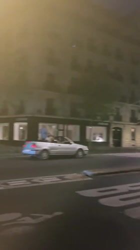 Nighttime street activity captured across central Paris locations