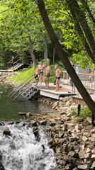 Wooden platform and waterfall at a Kazan waterfront access point