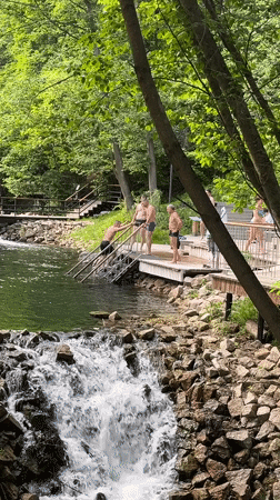 Wooden platform and waterfall at a Kazan waterfront access point