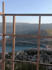 Bin El Ouidane lake viewed through abandoned concrete structure