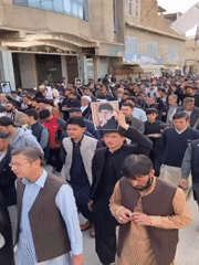 Large memorial procession carries portraits through Quetta streets