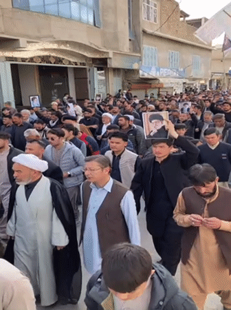 Large memorial procession carries portraits through Quetta streets