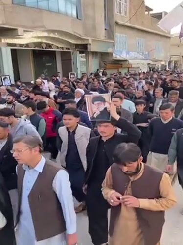 Large memorial procession carries portraits through Quetta streets