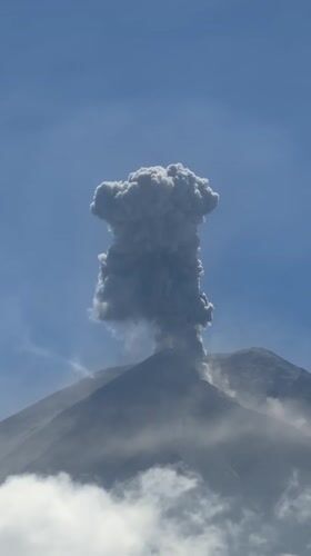 Indonesian volcano erupts, sending ash plume into clear sky