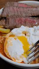 Ramen dinner documented in Sofia featuring steak and poached eggs
