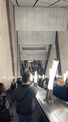 Rush hour flow through a busy Moscow Metro station