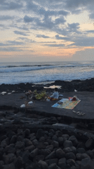 Traditional oceanside ceremony and beach sunset activities in Indonesia
