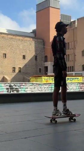 Skaters sessioning a plaza spot in Barcelona