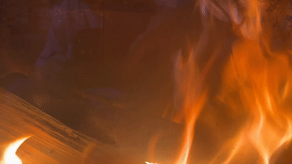 Evening scenes captured in Bulgarian village: fireplace flames, sunset clock