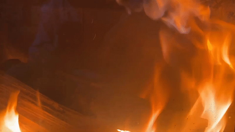 Evening scenes captured in Bulgarian village: fireplace flames, sunset clock