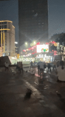 Group fitness dance session draws crowds in Liangjiang plaza