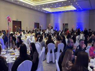 Formal evening event at Arica's convention center, late night