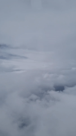 Dense clouds blanket Bulgarian skies, obscuring ground visibility