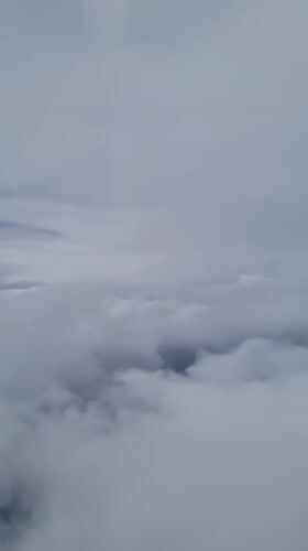 Dense clouds blanket Bulgarian skies, obscuring ground visibility