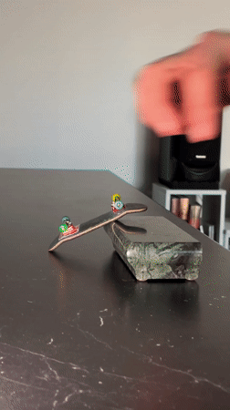 Everyday moments captured across Yekaterinburg: fingerboarding, dog walks, urban details