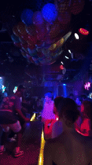 Crowded nightclub scene captured in Haizhu District evening