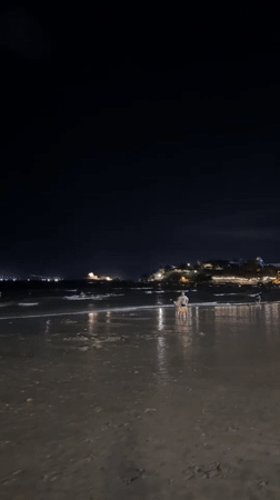 Nighttime beach activity captured in Nha Trang, Vietnam