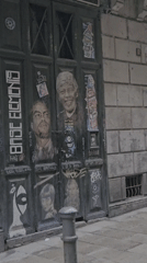 Street art documented on Barcelona doors and storefronts