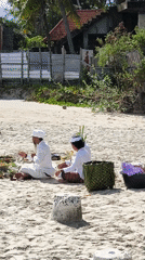 Traditional Balinese ceremony with musicians held on Nusa Penida beach