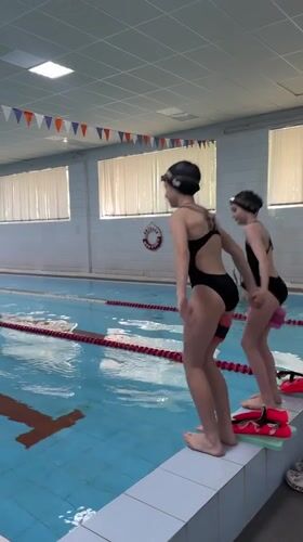 Young swimmers prepare on starter blocks in Birobidzhan pool