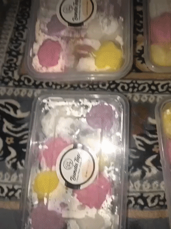 Evening snapshots document cats, desserts, neighborhood scenes in Lhokseumawe