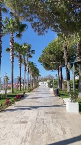 Morning stroll documented through scenic Kemer resort pathways
