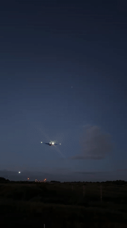 Commercial jet lifts off at dusk near Moscow