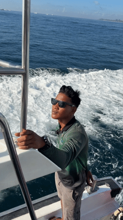 Man observed on moving boat near Denpasar, Indonesia