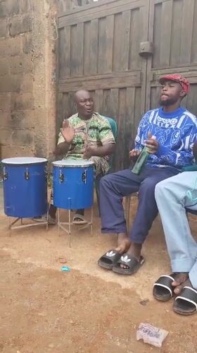 Outdoor hand drumming session with friends in Jos, Nigeria