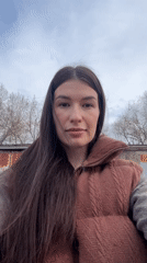 Woman documents outdoor activities and scenery in Chaikovsky, Russia