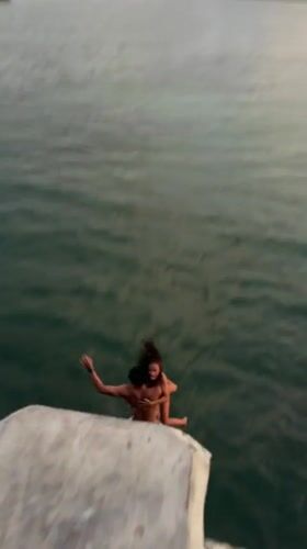 Bridge jumping draws crowds in General Luna, Philippines