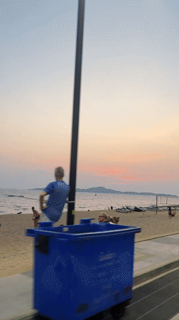 Beach activity observed in Pattaya with swimmers, jet skis