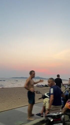 Beach activity observed in Pattaya with swimmers, jet skis