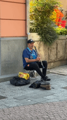 Street musicians perform near Roman ruins in Plovdiv