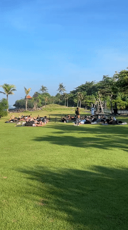 Outdoor yoga session observed in tropical Mengwi, Indonesia