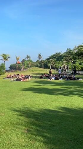 Outdoor yoga session observed in tropical Mengwi, Indonesia