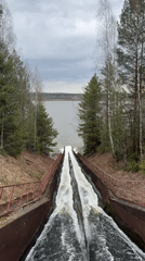 Dam spillways actively discharge water in Chernushka, Russia