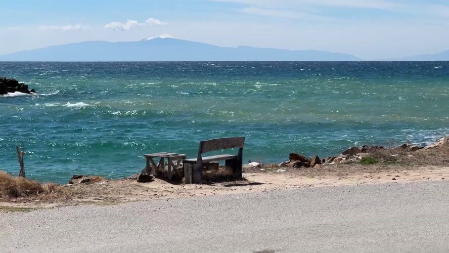 Coastal bench and table observed roadside in Greece