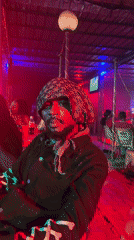 Performance event with colored lighting captured in Keffi, Nigeria