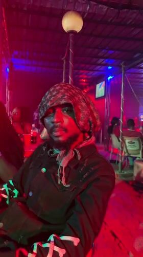 Performance event with colored lighting captured in Keffi, Nigeria