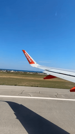EasyJet flight departs Nice airport over Mediterranean coast