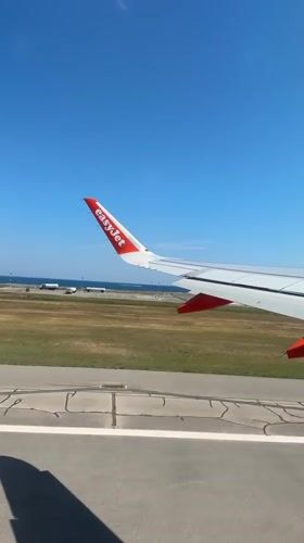 EasyJet flight departs Nice airport over Mediterranean coast