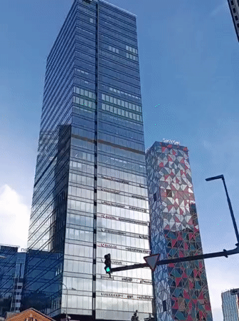 Tallinn's glass skyline on a clear summer afternoon