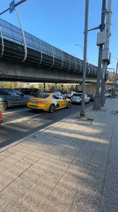 Traffic stops at red light in Moscow street