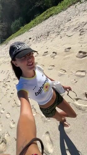 Bali beach morning: selfies, shoreline strolls, and paragliders