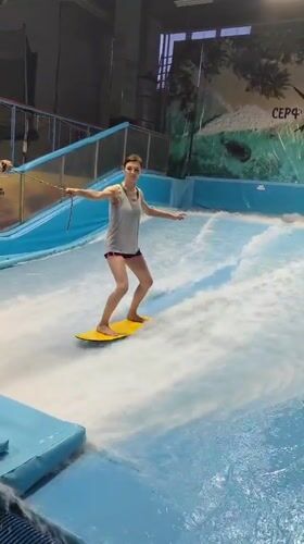 Indoor surfing session at a Saint Petersburg wave machine club