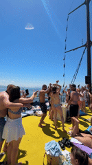Young adults enjoy sunny boat party off Menderes coast