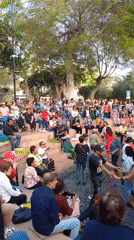 Couples dancing at an open-air plaza gathering in Miraflores