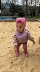 Woman, toddler enjoy morning playground visit in Wisła, Poland